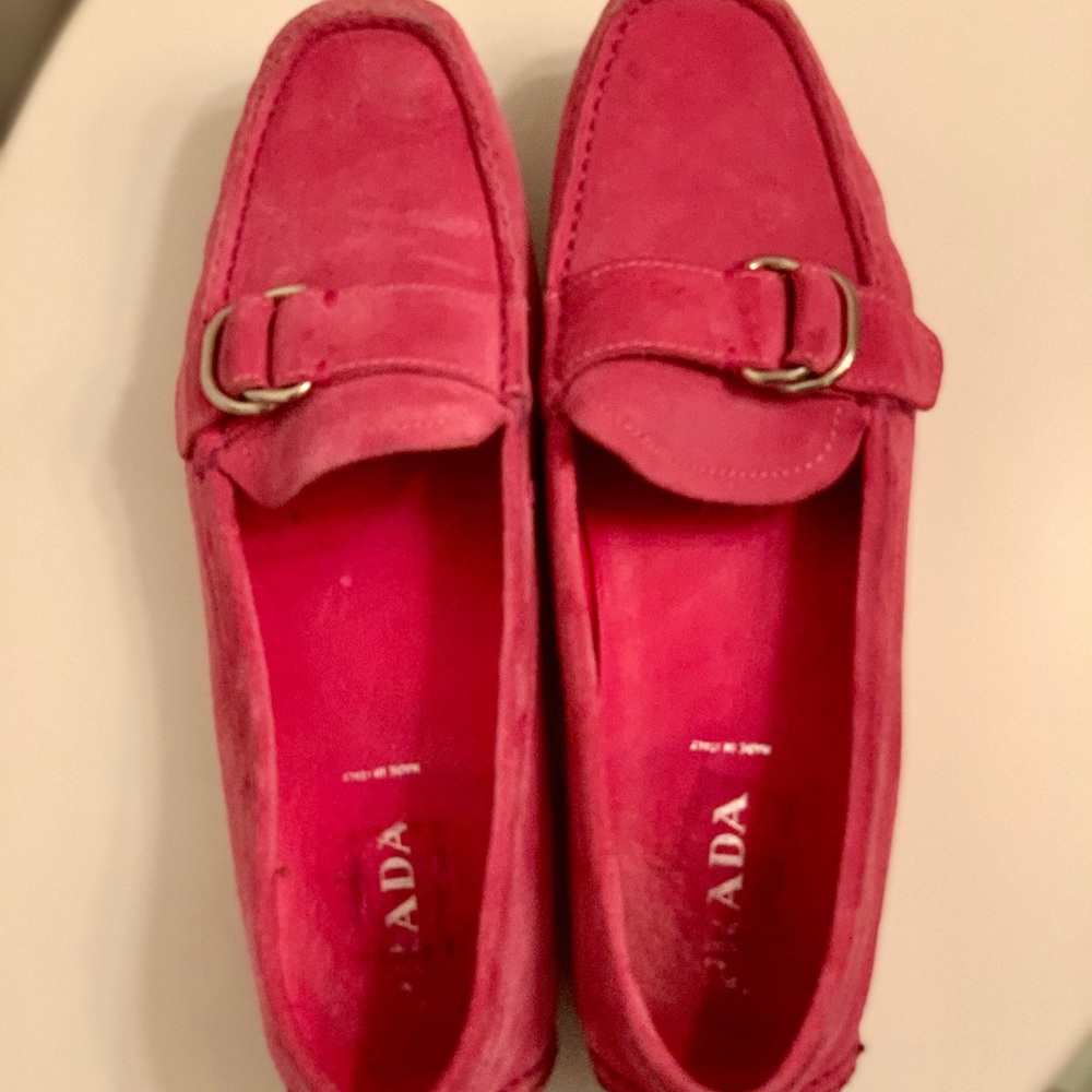 Prada hot pink suede loafers.